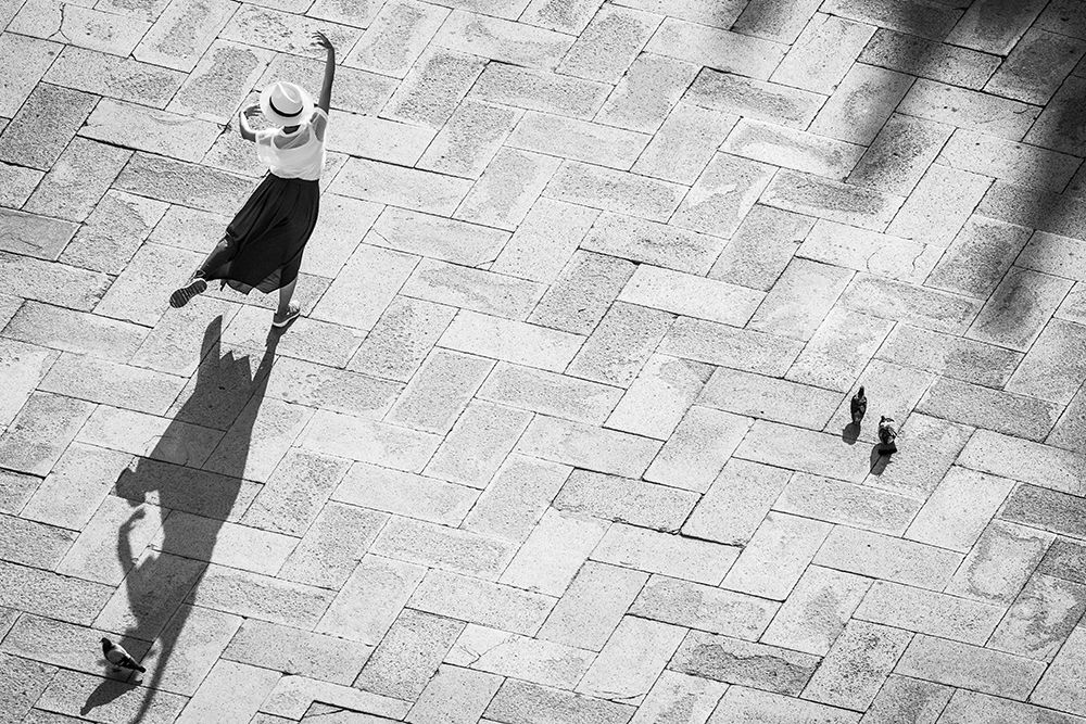 Europe-Italy-Venice-Black and white of tourist poising for photo on San Marco Square